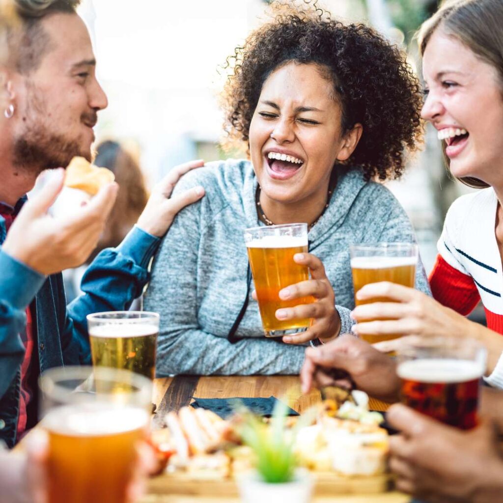 happy friends drinking beer
