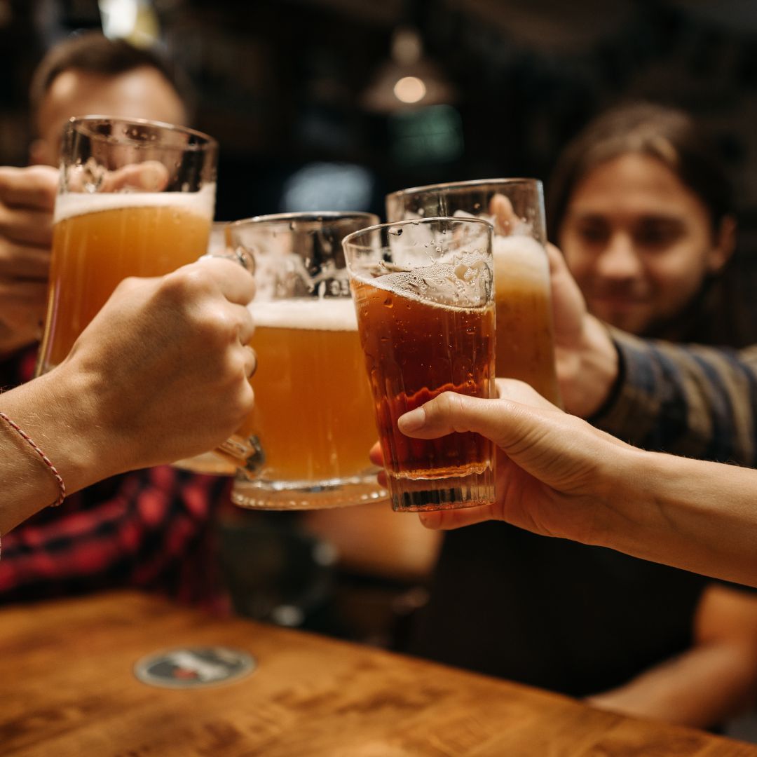 People toasting with beer
